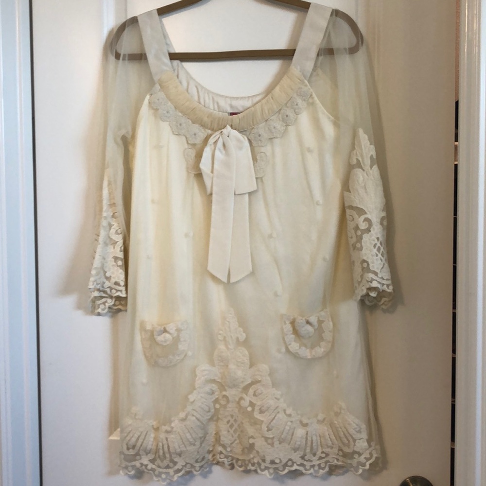 Baby doll style cream lace dress by Yoana Baraschi